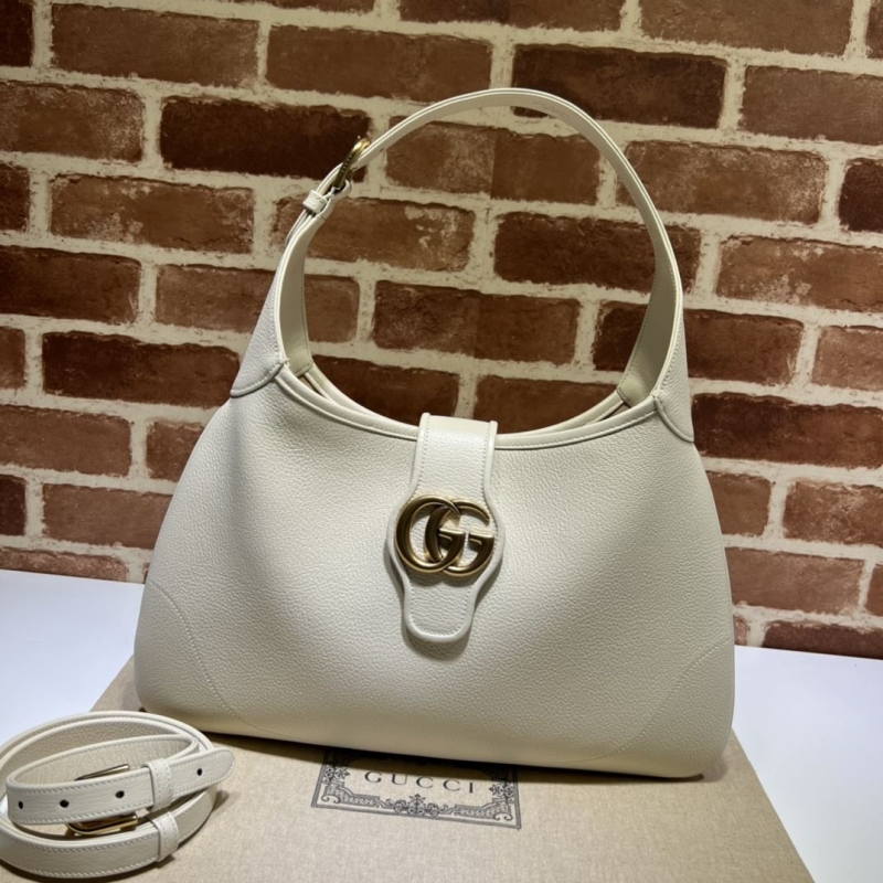 G*u*i top handle bags